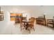 Basement kitchenette with island and seating area at 5218 Shadow Pond Ln, Charlotte, NC 28226