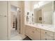 Well-appointed bathroom with double vanity and tile floors at 5218 Shadow Pond Ln, Charlotte, NC 28226