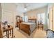 Charming bedroom with hardwood floors and plantation shutters at 5218 Shadow Pond Ln, Charlotte, NC 28226