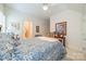 Comfortable bedroom with hardwood floors and access to a bathroom at 5218 Shadow Pond Ln, Charlotte, NC 28226