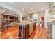 Open concept kitchen with island and views into Gathering room at 5218 Shadow Pond Ln, Charlotte, NC 28226