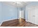 Bedroom with hardwood floors and double doors at 5428 Old Course Dr, Cramerton, NC 28032