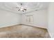 Large bedroom with ceiling fan and plush carpeting at 5428 Old Course Dr, Cramerton, NC 28032