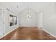 Bright dining room featuring hardwood floors and a chandelier at 5428 Old Course Dr, Cramerton, NC 28032