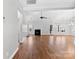 Living room with hardwood floors and a cozy fireplace at 5428 Old Course Dr, Cramerton, NC 28032