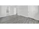 Gray-floored bedroom with doors and access to bathroom at 624 Gaywood Dr, Charlotte, NC 28273