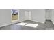 Spacious bedroom with gray flooring and large window at 624 Gaywood Dr, Charlotte, NC 28273