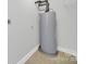 Bright laundry room with tile floor and a new water heater at 624 Gaywood Dr, Charlotte, NC 28273