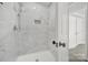 Clean and spacious shower with marble-look tile at 624 Gaywood Dr, Charlotte, NC 28273