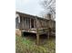 Back deck with sunroom and access to the yard at 7119 Neal Rd, Charlotte, NC 28262