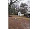 Large backyard with two storage sheds at 7119 Neal Rd, Charlotte, NC 28262