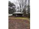 Backyard with storage shed and covered carport at 7119 Neal Rd, Charlotte, NC 28262