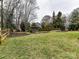 Large backyard with fire pit and gazebo at 8839 Blooming Arbor St, Huntersville, NC 28078