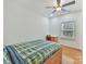 Charming bedroom with a double bed, ceiling fan, and hardwood floors at 8839 Blooming Arbor St, Huntersville, NC 28078