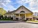 Community clubhouse with inviting front porch and landscaping at 8839 Blooming Arbor St, Huntersville, NC 28078