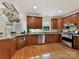 Spacious kitchen with granite countertops and stainless steel appliances at 8839 Blooming Arbor St, Huntersville, NC 28078