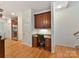 Kitchen with built-in desk and granite countertops at 8839 Blooming Arbor St, Huntersville, NC 28078