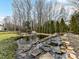 Koi pond with waterfall feature at 8839 Blooming Arbor St, Huntersville, NC 28078