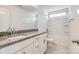 Bathroom boasts granite countertop, white cabinets, and a bathtub at 919 Emma Kate Ct, Lake Wylie, SC 29710