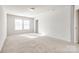 Bright bedroom featuring neutral carpeting and ample space at 919 Emma Kate Ct, Lake Wylie, SC 29710