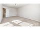 Well-lit bedroom with neutral walls and carpet flooring at 919 Emma Kate Ct, Lake Wylie, SC 29710