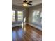 Bright living room with hardwood floors and large windows at 924 E Main St, Albemarle, NC 28001