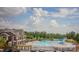 Community pool with lounge seating, water slides, and ample space for recreation at 9307 Dufaux Dr, Charlotte, NC 28278