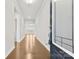 Inviting entryway with wood flooring, neutral paint, and a view into the spacious living areas at 9307 Dufaux Dr, Charlotte, NC 28278