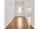 Bright foyer with hardwood flooring and a decorative glass front door at 9307 Dufaux Dr, Charlotte, NC 28278