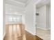 Hallway featuring hardwood flooring and views of the living room at 9307 Dufaux Dr, Charlotte, NC 28278