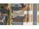 An overhead shot of the property featuring a well-maintained roof and tidy yard at 9307 Dufaux Dr, Charlotte, NC 28278