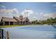 Blue tennis court outside community clubhouse at 9307 Dufaux Dr, Charlotte, NC 28278