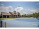 A tennis court with a clubhouse in a beautiful community at 9307 Dufaux Dr, Charlotte, NC 28278