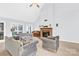 Living room with fireplace and access to the backyard at 1011 Emerson Dr, Mooresville, NC 28115