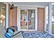 Screened porch with seating area and view of the backyard at 1011 Emerson Dr, Mooresville, NC 28115