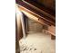 Unfinished attic space with plywood flooring and shelving at 1017 N Center Nw St, Hickory, NC 28601