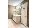 Bathroom with double vanity, mirror, and tiled floor at 1017 N Center Nw St, Hickory, NC 28601