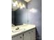 Bathroom with vanity, single sink, and shower at 1017 N Center Nw St, Hickory, NC 28601