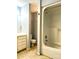 Bathroom with shower/tub combo and toilet at 1017 N Center Nw St, Hickory, NC 28601