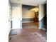 Inviting entryway with tile floors and a view of the stairs and living area at 1017 N Center Nw St, Hickory, NC 28601