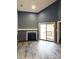 Living room fireplace with gray shiplap wall at 1017 N Center Nw St, Hickory, NC 28601