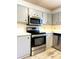 Stainless steel appliances and light gray cabinets at 1017 N Center Nw St, Hickory, NC 28601