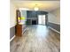 Spacious living room with wood-look floors and fireplace at 1017 N Center Nw St, Hickory, NC 28601