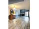 Living room with wood-look floors and fireplace at 1017 N Center Nw St, Hickory, NC 28601