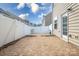 Private backyard patio with pavers and white vinyl fence at 105 Clarendon St # E, Mooresville, NC 28117