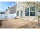 Private backyard patio with pavers and white vinyl fence at 105 Clarendon St # E, Mooresville, NC 28117