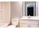 Clean bathroom with white vanity and shower/tub combo at 105 Clarendon St # E, Mooresville, NC 28117