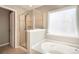 Bathroom with shower and garden tub at 105 Clarendon St # E, Mooresville, NC 28117