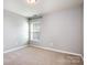 Simple bedroom with neutral wall color at 105 Clarendon St # E, Mooresville, NC 28117