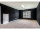 Spacious bedroom with dark walls and neutral carpet at 105 Clarendon St # E, Mooresville, NC 28117